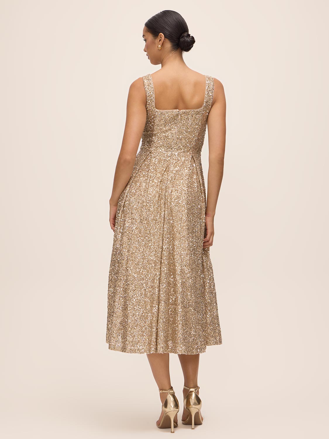 Gold Sequin Fit & Flare Midi Dress with Pleating - Back View - Le Chateau
