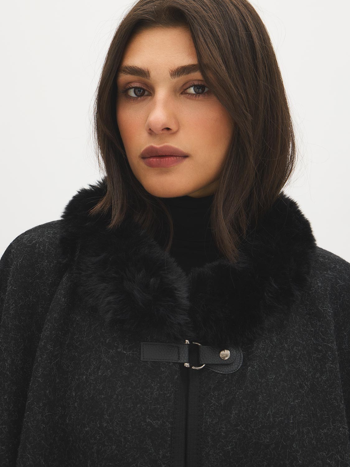 Black Knit Cape with Faux Fur Trim - Close-up Collar Detail - Suzy Shier