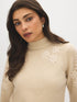 Beige Floral Embroidered Mock Neck Sweater - Close-up Fabric Detail - Suzy Shier