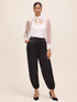 Black Satin Balloon Leg Pant - Woman Wearing Elegant Evening Pants - Le Chateau