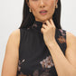 Jet Black Floral Print Mesh Funnel Neck Top - Close-up Fabric Detail - Suzy Shier