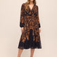 Dijon/Black Paisley Crossover Midi Dress - Woman Wearing Pleated Dress with Twist Front - Le Chateau
