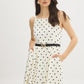 Snow White Polka Dot Flowy Midi Dress - Woman Wearing Spaghetti Strap Dress with Belt - Suzy Shier