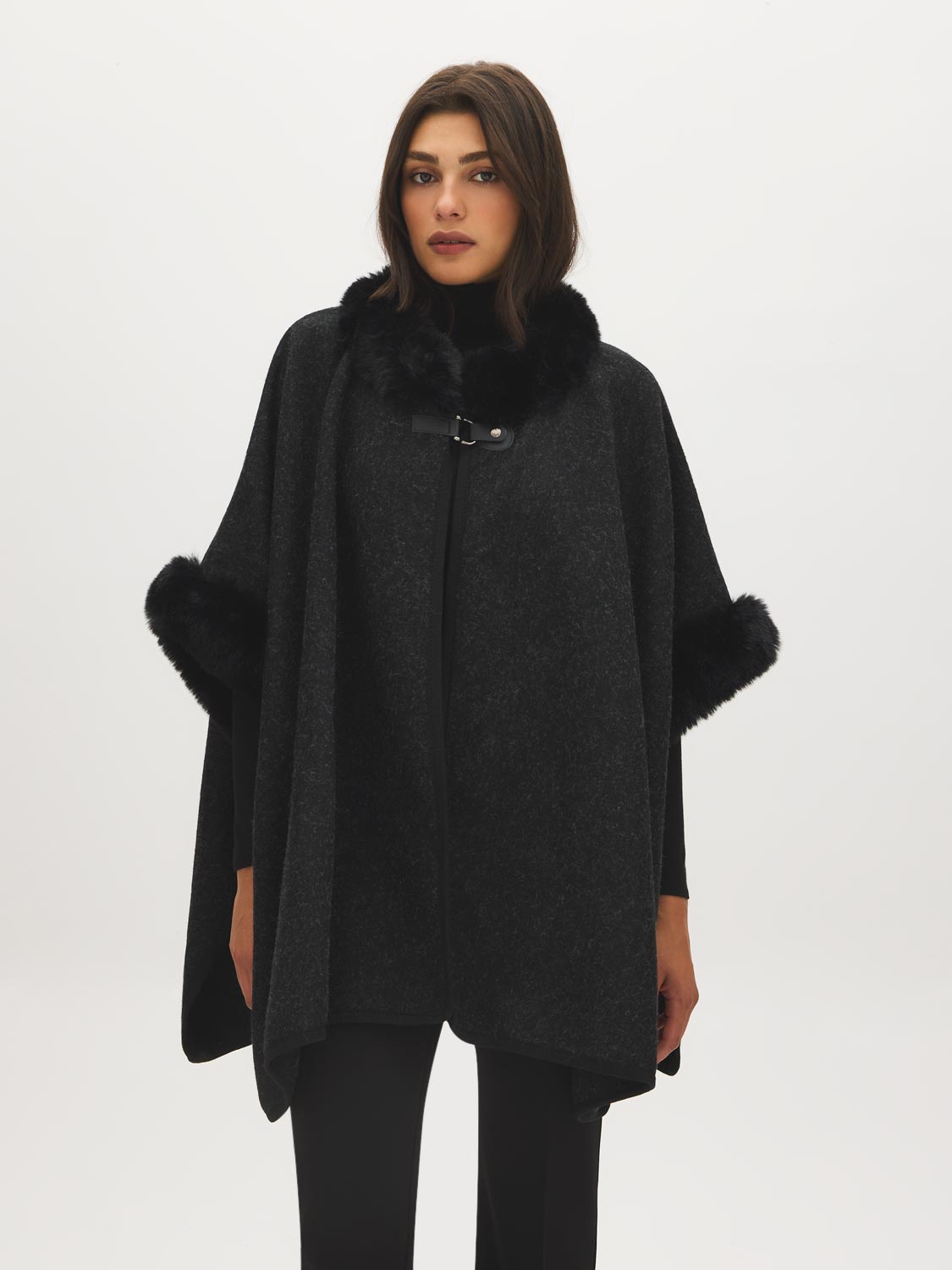 Black Knit Cape with Faux Fur Trim - Woman Wearing Elegant Cape with Fur Details - Suzy Shier