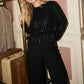 Black Sequin Top with Balloon Sleeves - Woman Wearing Sparkling Knit Top - Suzy Shier