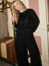 Black Sequin Top with Balloon Sleeves - Woman Wearing Sparkling Knit Top - Suzy Shier