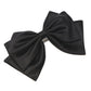 Black Satin Bow Hair Clip - Close-up of Elegant Hair Accessory - Suzy Shier