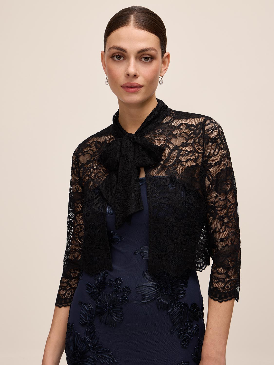 Black Lace Bolero with 3/4 Sleeves and Bow Ties - Woman Wearing Elegant Cover-Up - Le Chateau