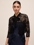 Black Lace Bolero with 3/4 Sleeves and Bow Ties - Woman Wearing Elegant Cover-Up - Le Chateau