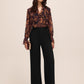 Black Wide Leg Woven Pants with Side Button Detail - Woman Wearing Tailored Trousers - Le Chateau