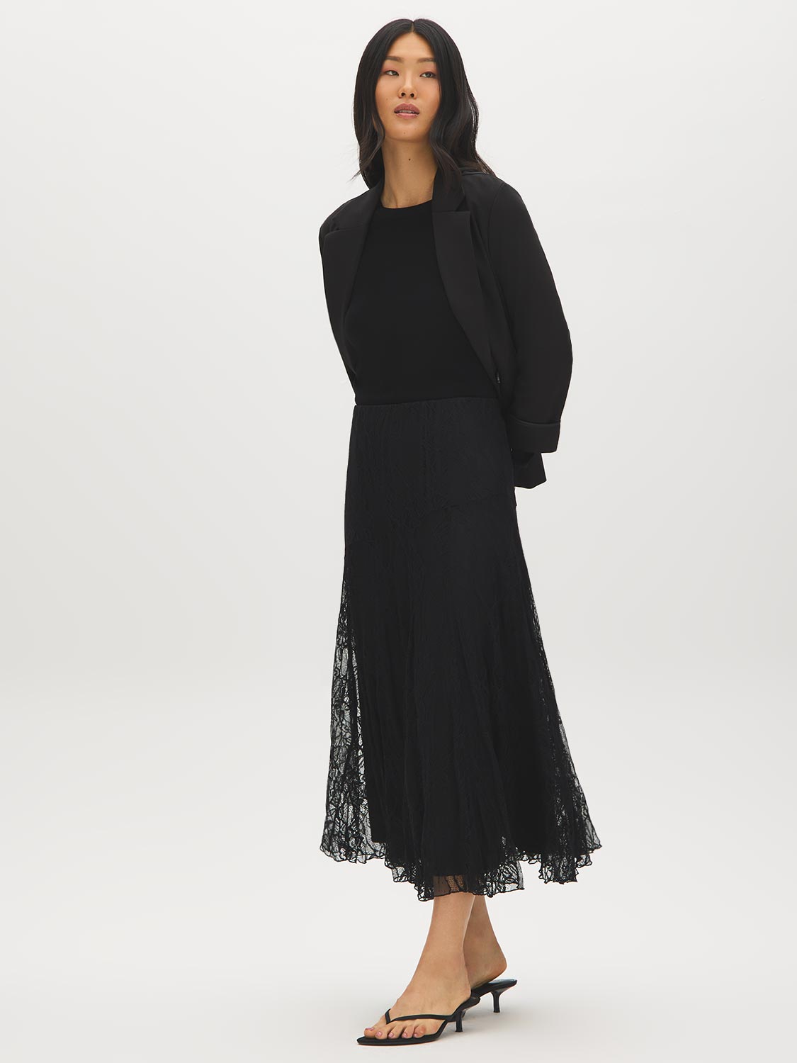 Black Lace Skirt with Diagonal Drop Waist - Full Body View - Suzy Shier
