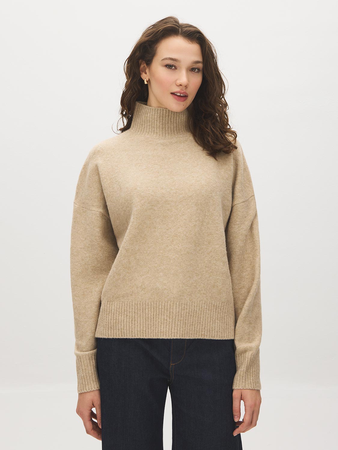 Fancy Beige Melange Mock Neck Knit Sweater - Woman Wearing Cozy Dropped Shoulder Pullover - Suzy Shier