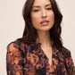 Black/Toffee Paisley Ruffle Blouse - Close-up Fabric Detail - Le Chateau