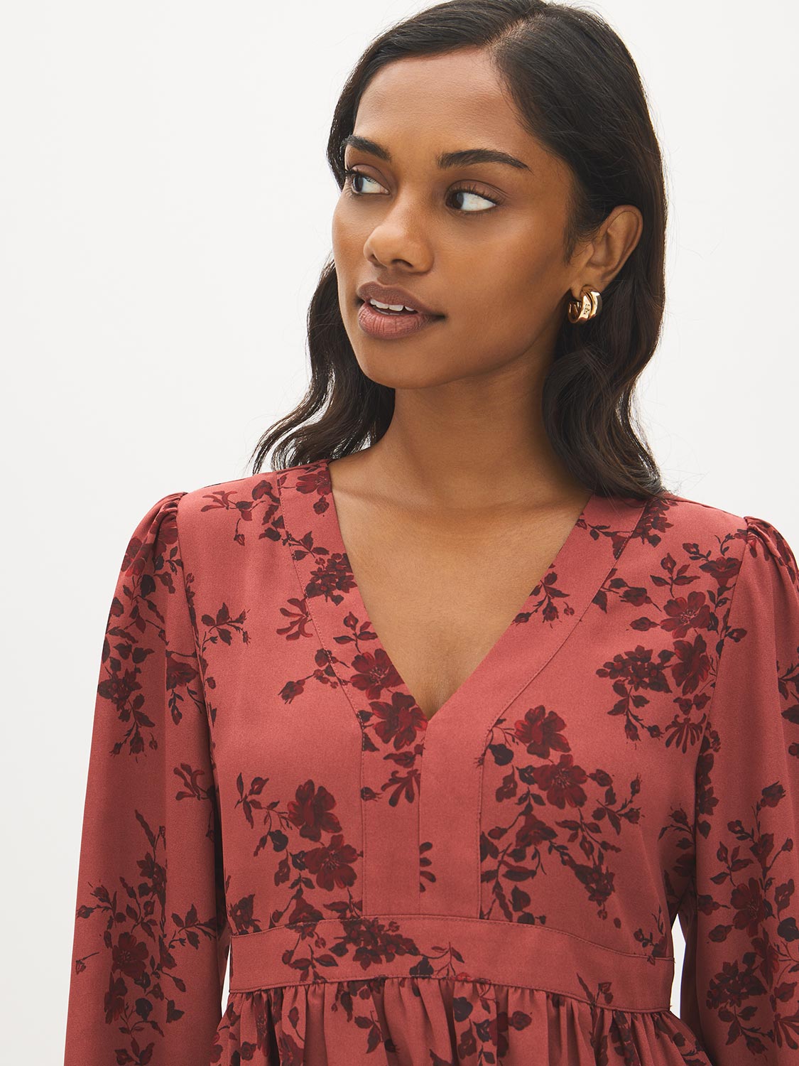 Apple Butter Printed Crinkle Satin Peplum Blouse - Close-up Fabric Detail - Suzy Shier