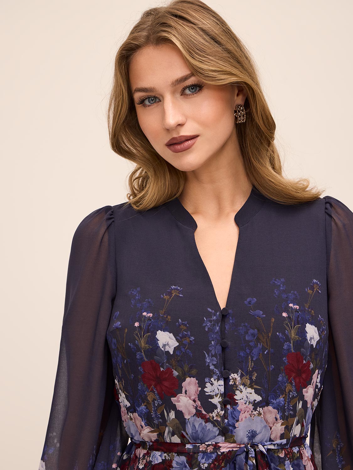 Dark Sapphire Border Floral Midi Dress with Puff Sleeves - Close-up Split Neckline Detail - Le Chateau