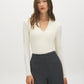 Egret Ribbed Deep V-Neck Stretch Jersey Top - Woman Wearing Fitted Long Sleeve Top - Suzy Shier
