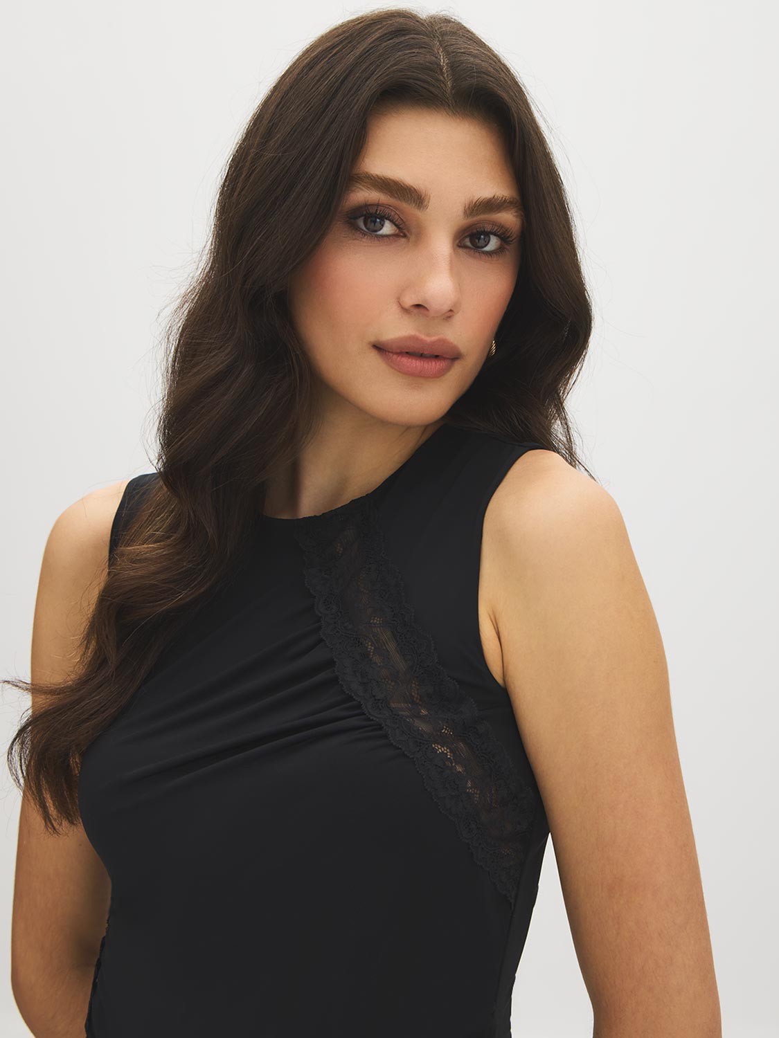 Jet Black Sleeveless Double Layer Top with Mesh Inserts - Close-up Fabric Detail - Suzy Shier