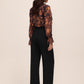 Black Wide Leg Woven Pants with Side Button Detail - Back View - Le Chateau