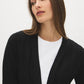 Black Ribbed Knit Duster Sweater - Close-up Fabric Detail - Suzy Shier
