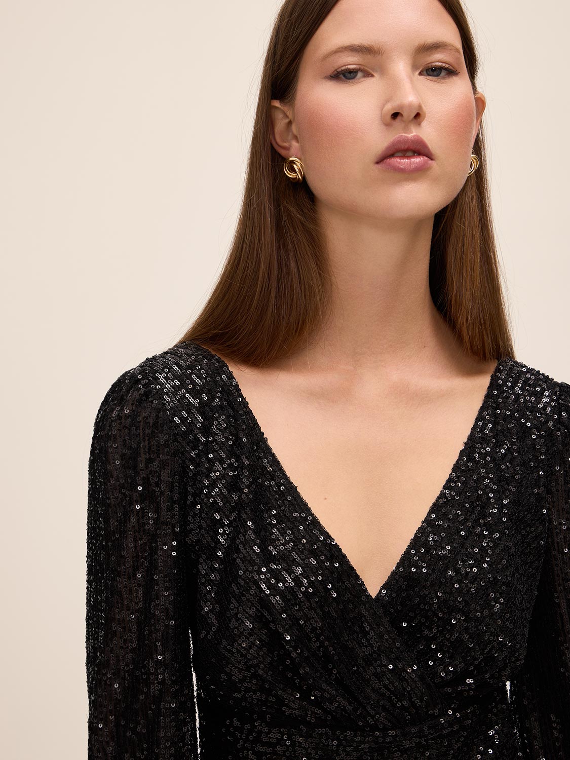 Black Sequin V-Neck Fit and Flare Mini Dress - Close-up V-Neck Detail - Le Chateau