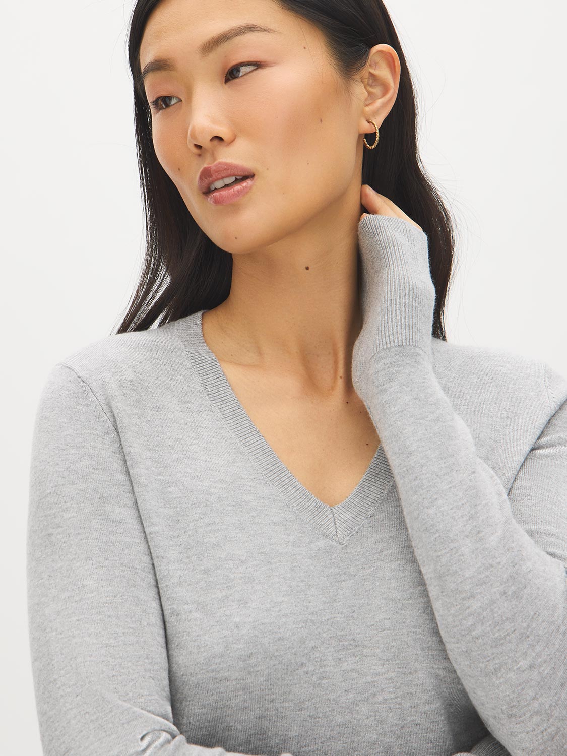 Lunar Melange V-Neck Knit Sweater with Ribbed Cuffs - Close-up Neckline Detail - Suzy Shier