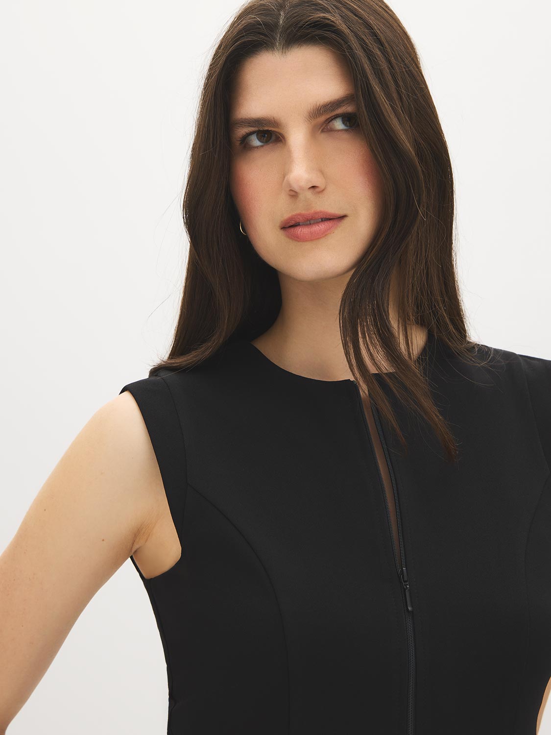 Black Sleeveless Zip-Front Vest Top - Close-up Front Detail - Suzy Shier