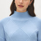 Soft Blue Mock Neck Sweater with Diamond Pattern - Close-up Fabric Detail - Suzy Shier