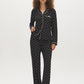 Jet Black/Snow White Polka Dot Two-Piece PJ Set - Woman Wearing Comfortable Knit Pajamas - Suzy Shier