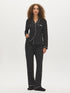 Jet Black/Snow White Polka Dot Two-Piece PJ Set - Woman Wearing Comfortable Knit Pajamas - Suzy Shier