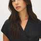 Black Kimono Wrap Blouse with Waist Tie - Close-up Fabric Detail - Suzy Shier