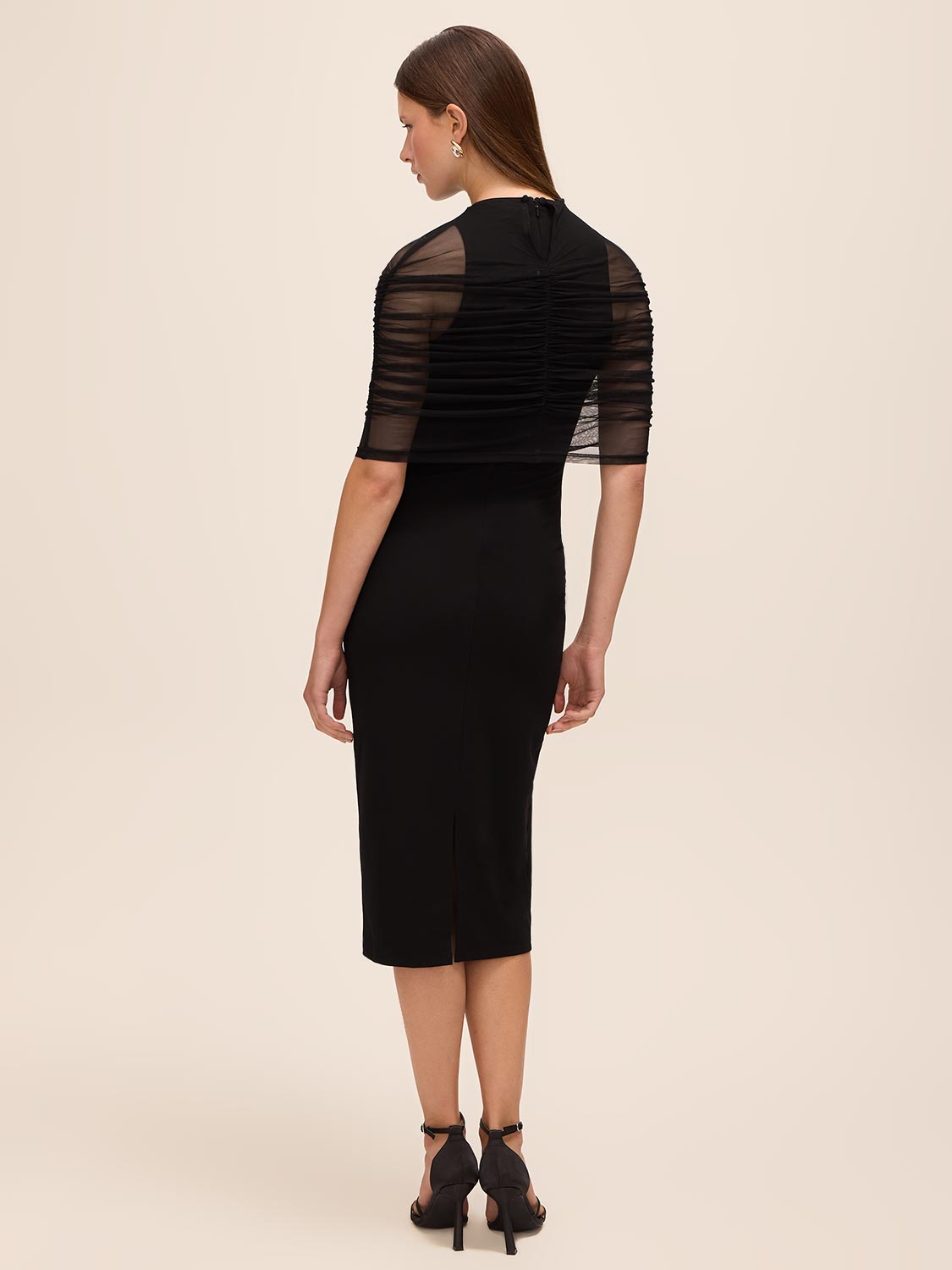 Black Knit Crepe Sheath Dress with Mesh Cape Overlay - Back View - Le Chateau