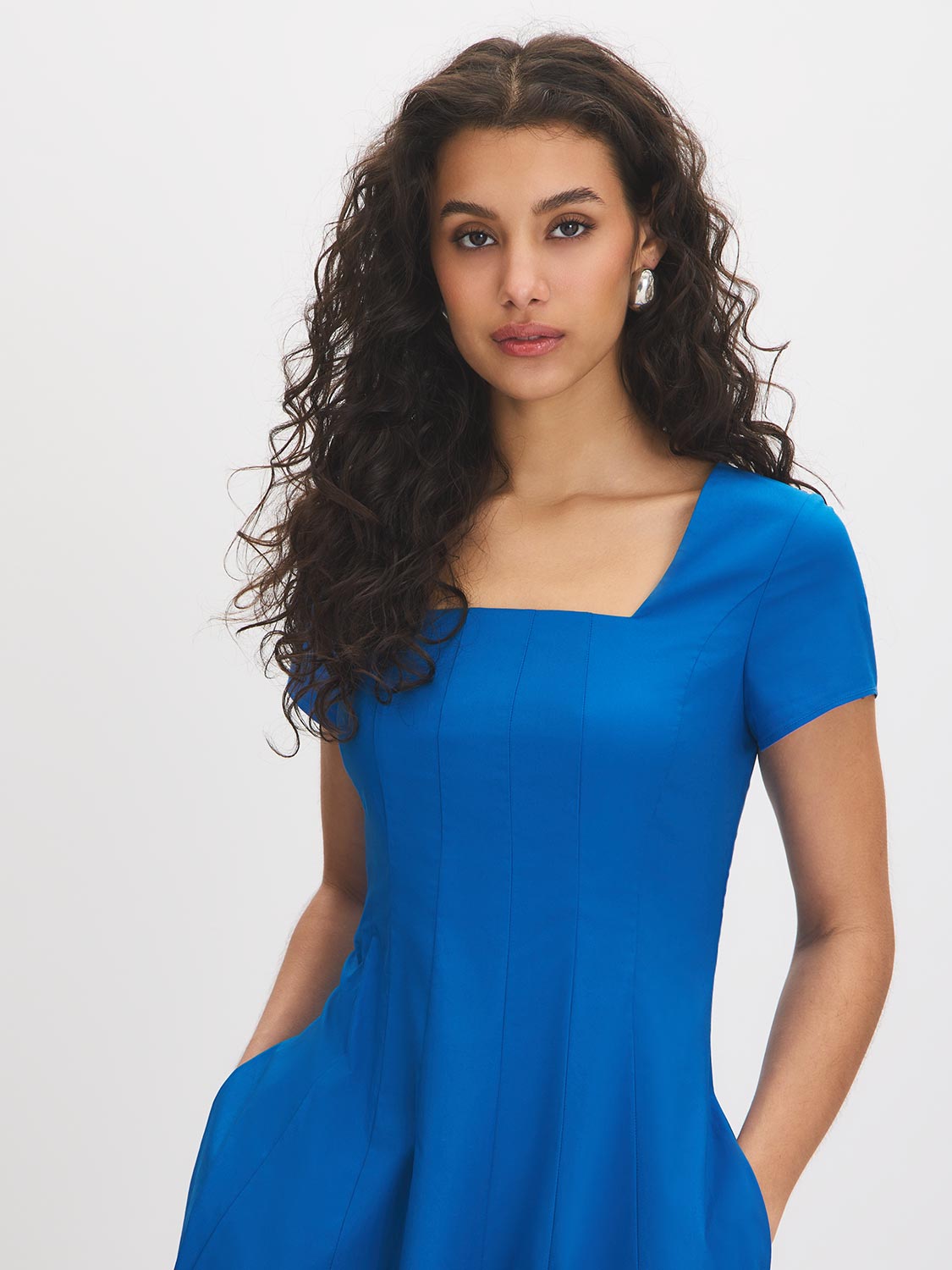 Classic Blue Square Neck Poplin Dress - Woman Wearing Cap Sleeve Dress with Paneled Detail - Suzy Shier