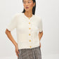 Snow White Short Sleeve Ribbed Button-Front Cardigan - Woman Wearing Knit Sweater - Suzy Shier