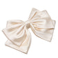 Black Satin Bow Hair Clip - Front View - Suzy Shier