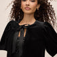 Black Velour Bolero with Satin Bow Ties - Close-up Front Detail - Le Chateau
