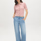 Zephyre Short Sleeve Cable Knit Button-Front Sweater - Woman Wearing Knit Top with Ribbed Hem - Suzy Shier