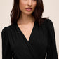 Black Crossover Neck Knit Jumpsuit - Close-up Neckline Detail - Le Chateau