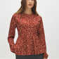 Arabian Spice Satin-Like Animal Print Peplum Blouse - Woman Wearing Long Sleeve Blouse - Suzy Shier