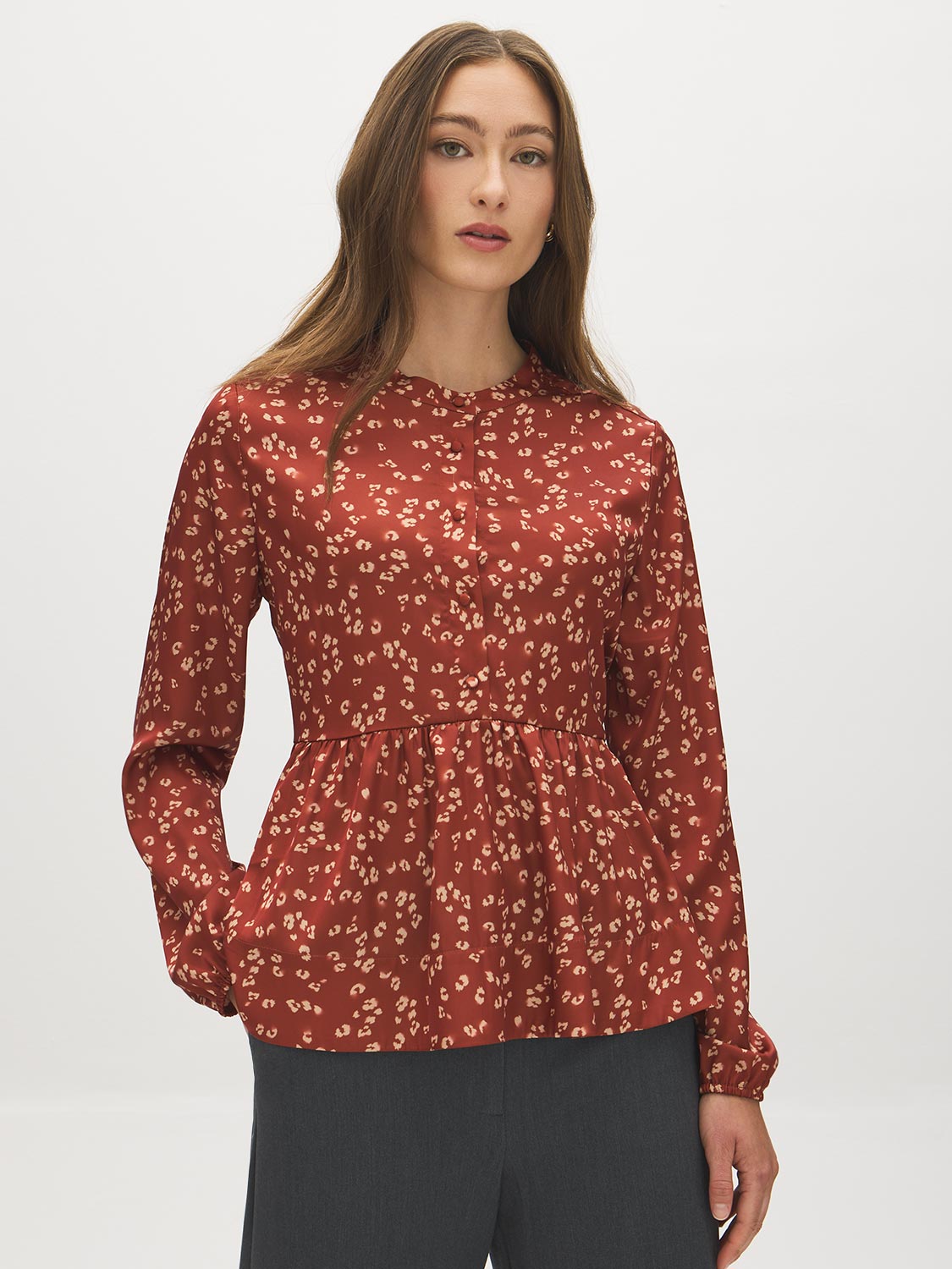 Arabian Spice Satin-Like Animal Print Peplum Blouse - Woman Wearing Long Sleeve Blouse - Suzy Shier