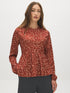 Arabian Spice Satin-Like Animal Print Peplum Blouse - Woman Wearing Long Sleeve Blouse - Suzy Shier