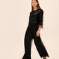 Black Sequin Fringe Bolero Cover Up - Walking View - Le Chateau