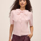 Pink Dust Short Sleeve Cardigan with Organza Bow - Front View - Le Chateau