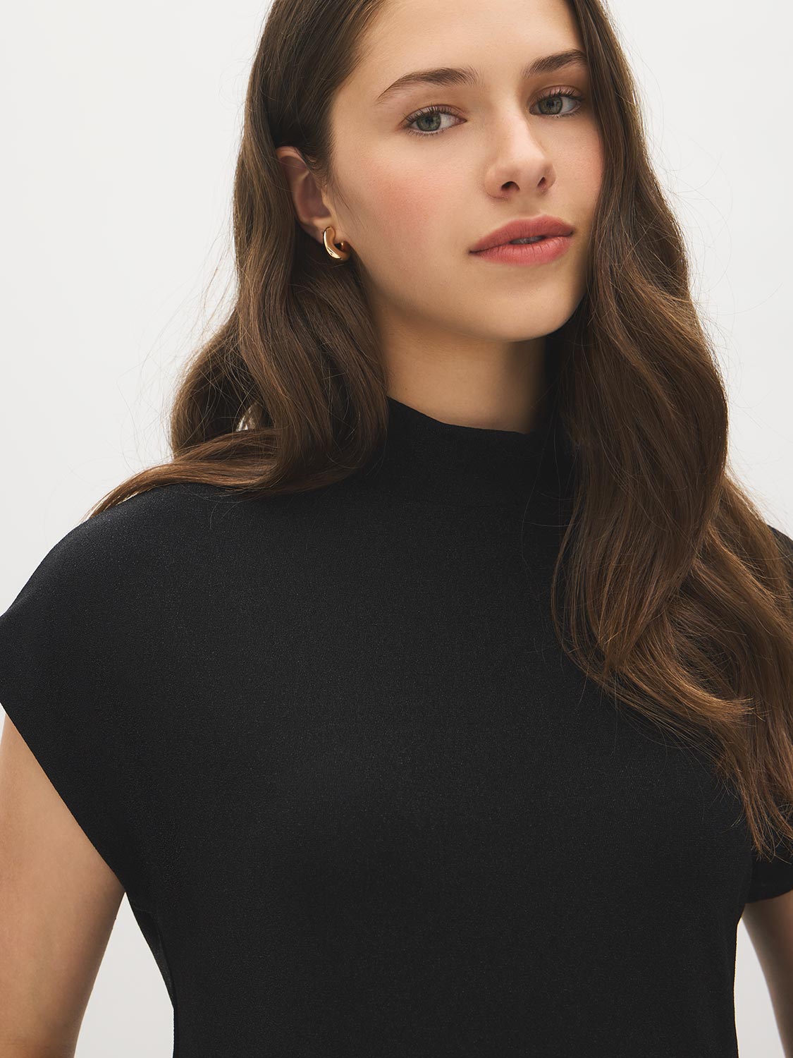 Black Mock Neck Shimmer Asymmetrical Top - Close-up Fabric Detail - Suzy Shier