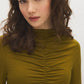 Guacamole Mock Neck Jersey Top with Ruched Detail - Close-up Fabric Detail - Suzy Shier