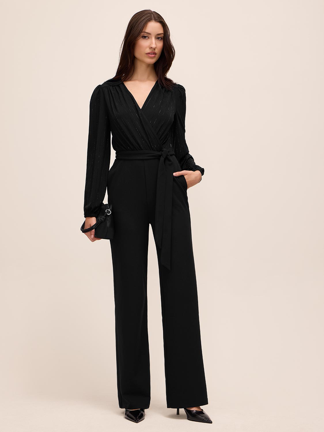 Black Crossover Neck Knit Jumpsuit - Woman Wearing Wide-Leg Evening Jumpsuit - Le Chateau