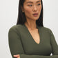 Guacamole Deep V-Neck Ribbed Knit Top - Close-up Fabric Detail - Suzy Shier