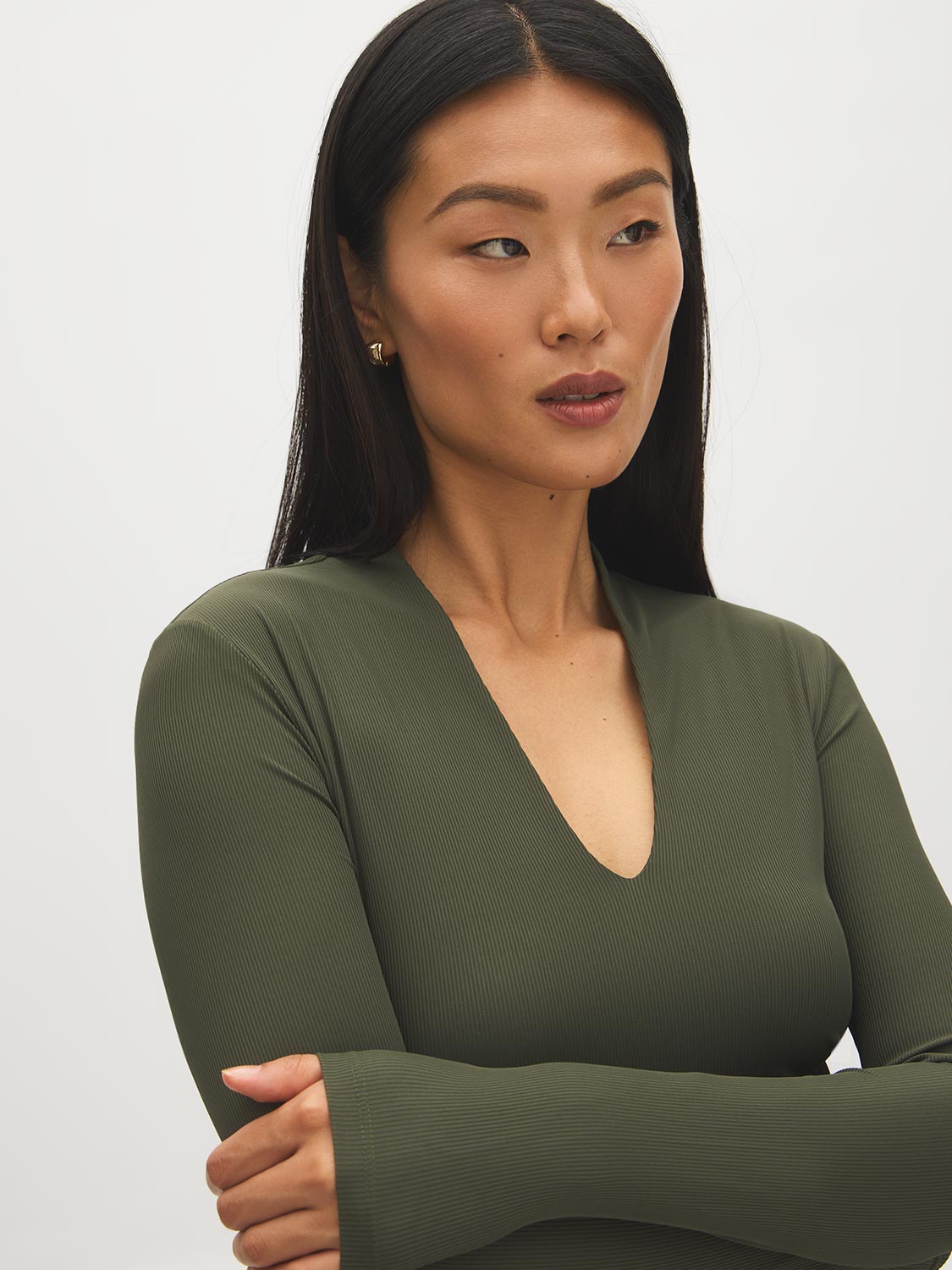 Guacamole Deep V-Neck Ribbed Knit Top - Close-up Fabric Detail - Suzy Shier