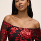 Red/Black Off-Shoulder Sequin Gown with Illusion Sleeves - Close-up Neckline Detail - Le Chateau