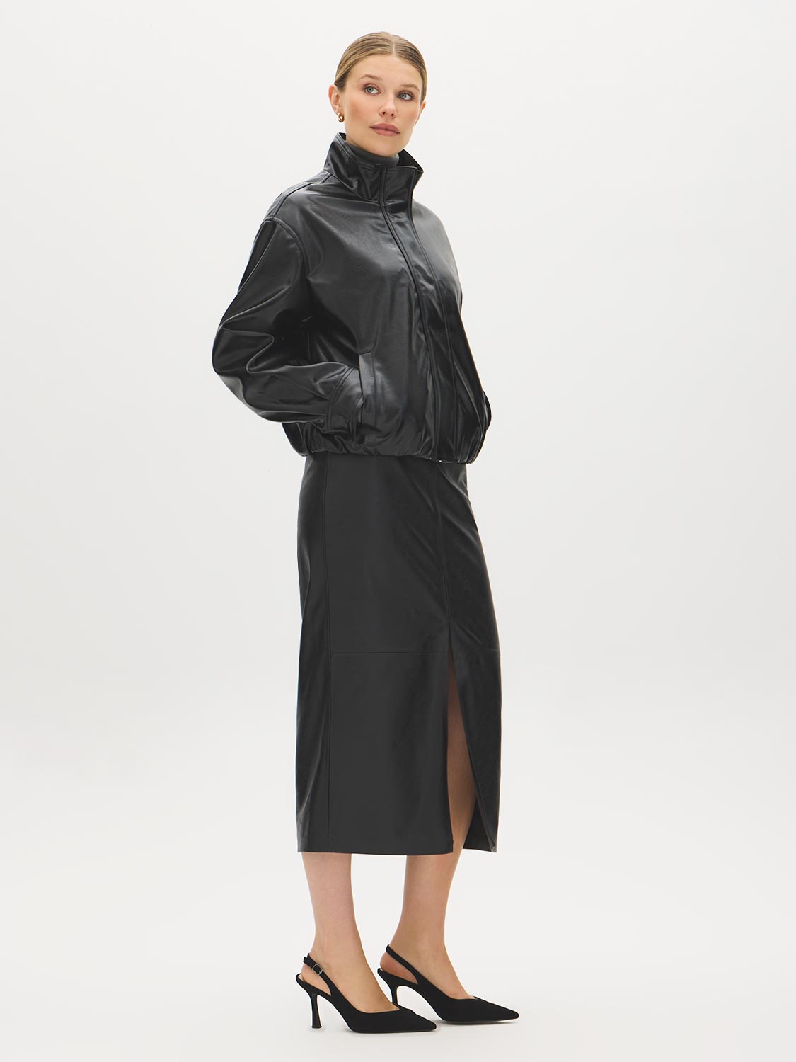 Black Textured Faux Leather Midi Skirt - Side Profile View - Suzy Shier