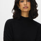 Black Mock Neck Sweater with Diamond Pattern - Close-up Fabric Detail - Suzy Shier